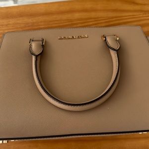 Michael Kors Purse used but in good condition,  nude color